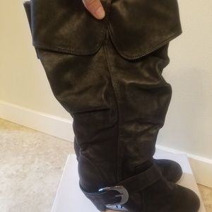 Black tall boots with short heel